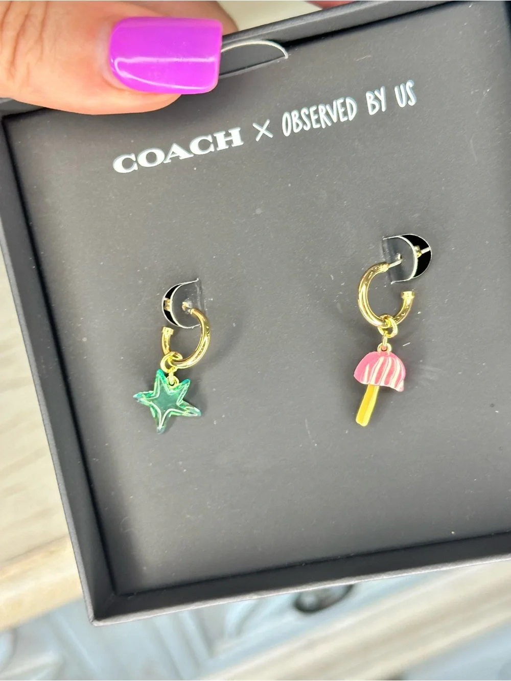 Coach Gold-Tone Hoop Earrings with Star & Mushroom Charms - Picture 3 of 5